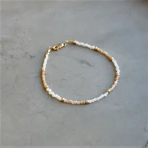Bohemian style beaded bracelet with natural stones and golden beads for women