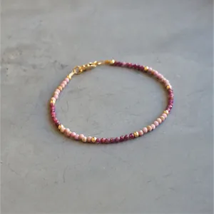 Bohemian multilayered natural stone beaded bracelet with pink gems and gold spacers