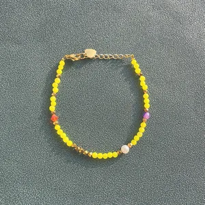 Bracelet en acier titane plaqué or 18K avec perles d'eau douce et perles colorées