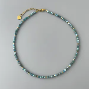 Vintage blue apatite beaded necklace with golden heart pendant and faceted gemstone beads