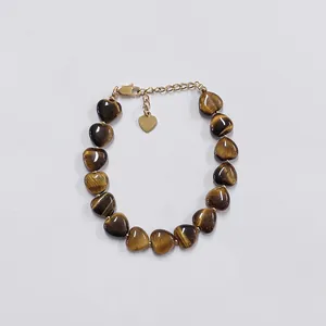 Bracciale vintage francese con cuori in occhio di tigre e chiusura a moschettone dorata