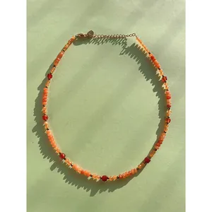 Vibrant orange and red natural stone beaded necklace with sweet candy square accents