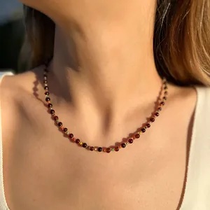 Handmade necklace with deep red natural stones and multi-colored beads for women