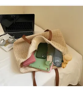 Straw tote bag showing large interior space for tablet and daily essentials