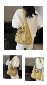 Detail of cream crochet tote bag featuring hollow knit texture and oversized beach style
