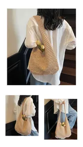 Close-up of beige woven mesh tote bag showing intricate knit pattern and hollow design