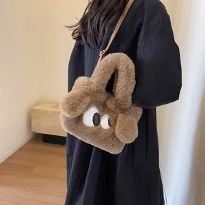 Borsa tote marrone di peluche con grandi occhi a fumetto e morbida pelliccia sintetica