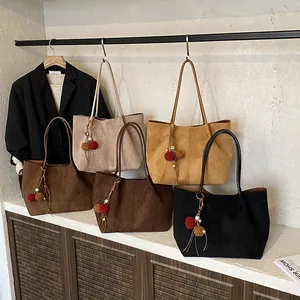 Stylish large capacity suede tote bags in various colors with cute fur ball charms