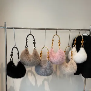 Plush faux fur crescent handbags with wooden bead handles in six assorted colors