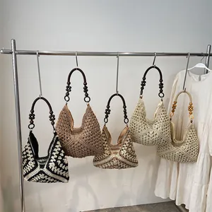 Handwoven shoulder bags in five colors with beaded handles for summer vacation style