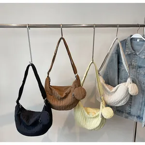 Pleated canvas tote bag set with mini coin purse in black, brown, and cream tones
