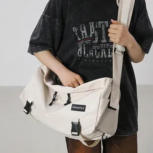 Off-white large nylon messenger bag with adjustable strap and buckles for daily commute