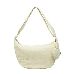 Minimalist beige pleated crescent tote bag with detachable round coin purse charm