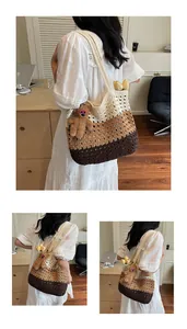 Detail of gradient crochet tote bag with openwork texture and cute bear charm accessory