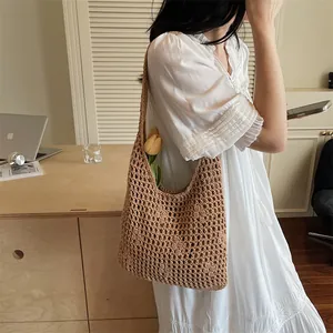 Bohemian hollow out woven shoulder bag in brown cotton thread for summer beach vacations