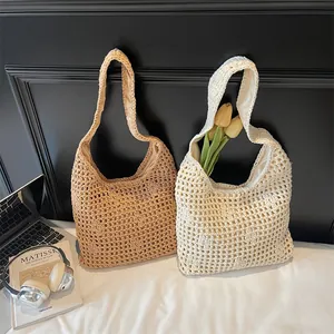 Handmade hollow crochet tote bag in khaki and beige tones with cotton inner lining