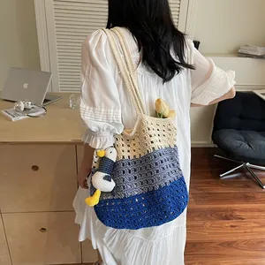 Handmade crochet hollow tote bag in tricolor block design with cute duck pendant