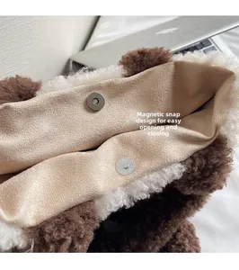 Detail of the magnetic buckle on the plush teddy fabric tote bag, easy open and close