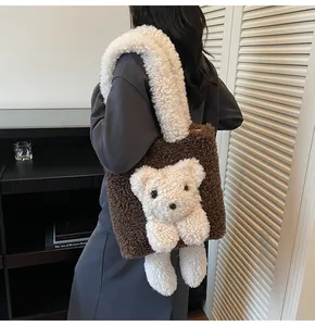 Detail of plush brown teddy bear tote bag with soft lamb wool texture on shoulder