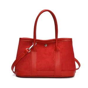 Minimalist red contrast tote bag in matte suede and smooth leather for women
