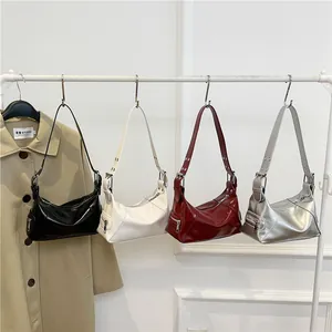 Minimalist faux leather underarm bags in black, cream, burgundy and silver colors