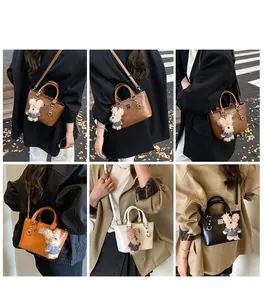 Detail shots of solid color bucket bags with bear pendants in multiple fashion styles