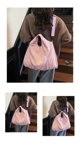 Detail of taro purple casual canvas bag showing soft pleated texture and wide strap