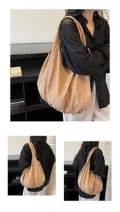 Detailed views of the large brown suede tote bag showing soft texture and spacious structure