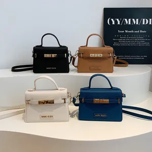 Minimalist top-handle handbags in four colors with gold buckles and removable straps