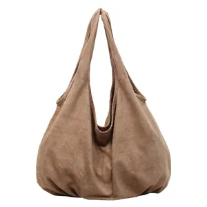 Brown large capacity suede tote bag with a minimalist slouchy hobo design for women