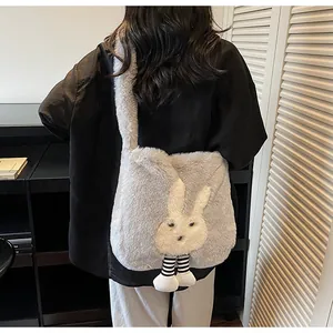 Plush grey rabbit tote bag with fuzzy texture and cute long legs worn as a crossbody