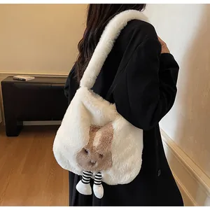 Detail of white plush rabbit tote bag with striped legs shown on a shoulder