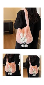 Detail of pink plush rabbit tote bag featuring soft faux fur texture and cute animal design