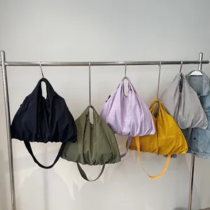 Fashionable quilted canvas tote bags in five vibrant colors for versatile daily use