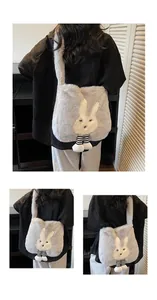 Detailed close-up of a soft grey plush rabbit tote bag featuring striped doll legs
