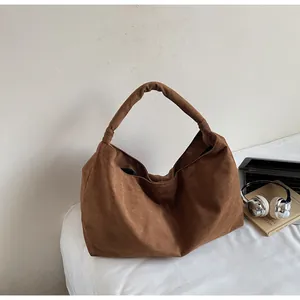 Brown large capacity suede hobo bag with unique knotted shoulder strap for daily use