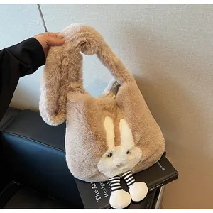 Detail of cute plush rabbit tote bag featuring striped legs and soft faux fur texture
