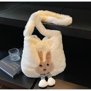 Detailed close-up of plush rabbit tote bag with striped socks and fuzzy texture