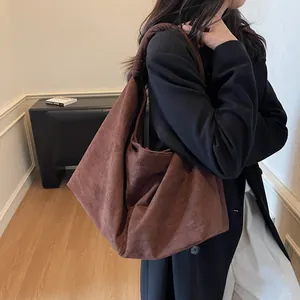 Brown large capacity suede shoulder bag in minimalist hobo style for daily use