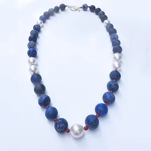 Blue natural stone beads and freshwater pearl necklace with gold toggle clasp