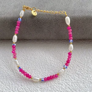 Detailed view of colorful natural stone beaded bracelet with 18K gold plated steel chain