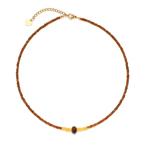 Collier vintage en perles d'oeil de tigre avec fermoir en acier titane doré élégant