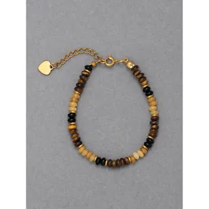 Bracelet vintage français avec perles œil de tigre et breloque en forme de cœur