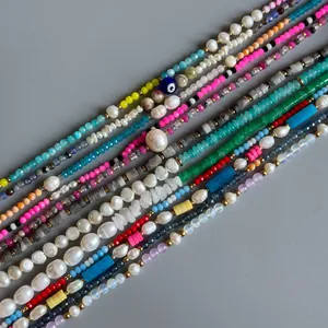 Colorful gemstone and pearl beaded necklace with 18k gold plating in a bohemian style