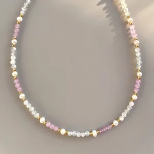 Beaded necklace featuring natural pearls, purple stones, and 18k gold-plated steel beads