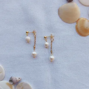Elegant gold plated titanium earrings with natural freshwater pearls and long tassels