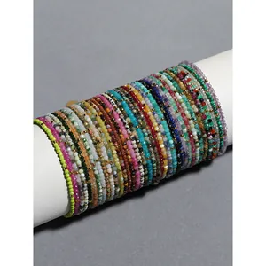 Bracelet en perles de pierre naturelle colorée fait main avec perles dorées
