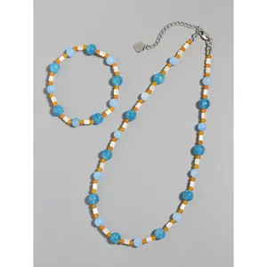 Blue and orange natural stone beaded jewelry set with white shell necklace and bracelet