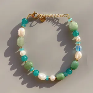 Handmade bracelet with baroque pearls, green natural stones and golden metal clasp