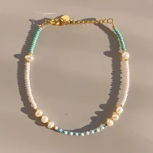 Macro detail of dopamine-style glass bead bracelet with natural freshwater pearls